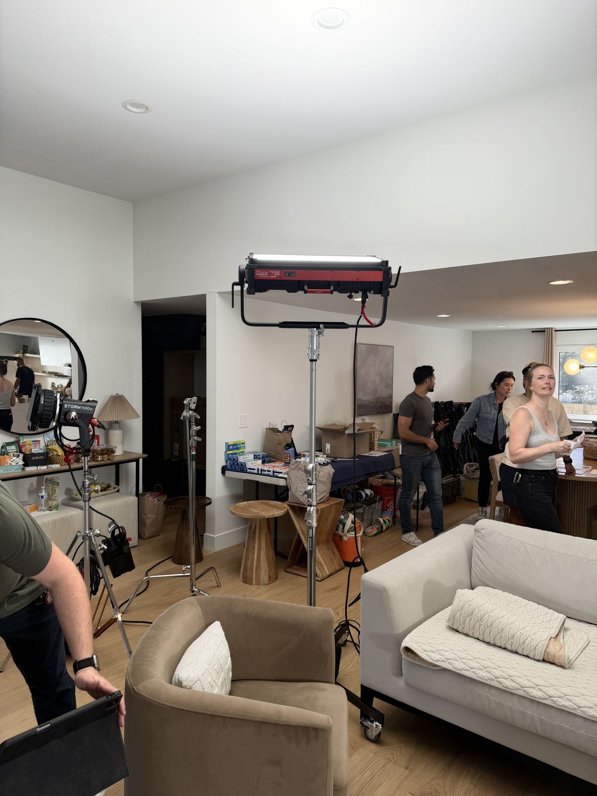 Crew and lights in the living room between setups